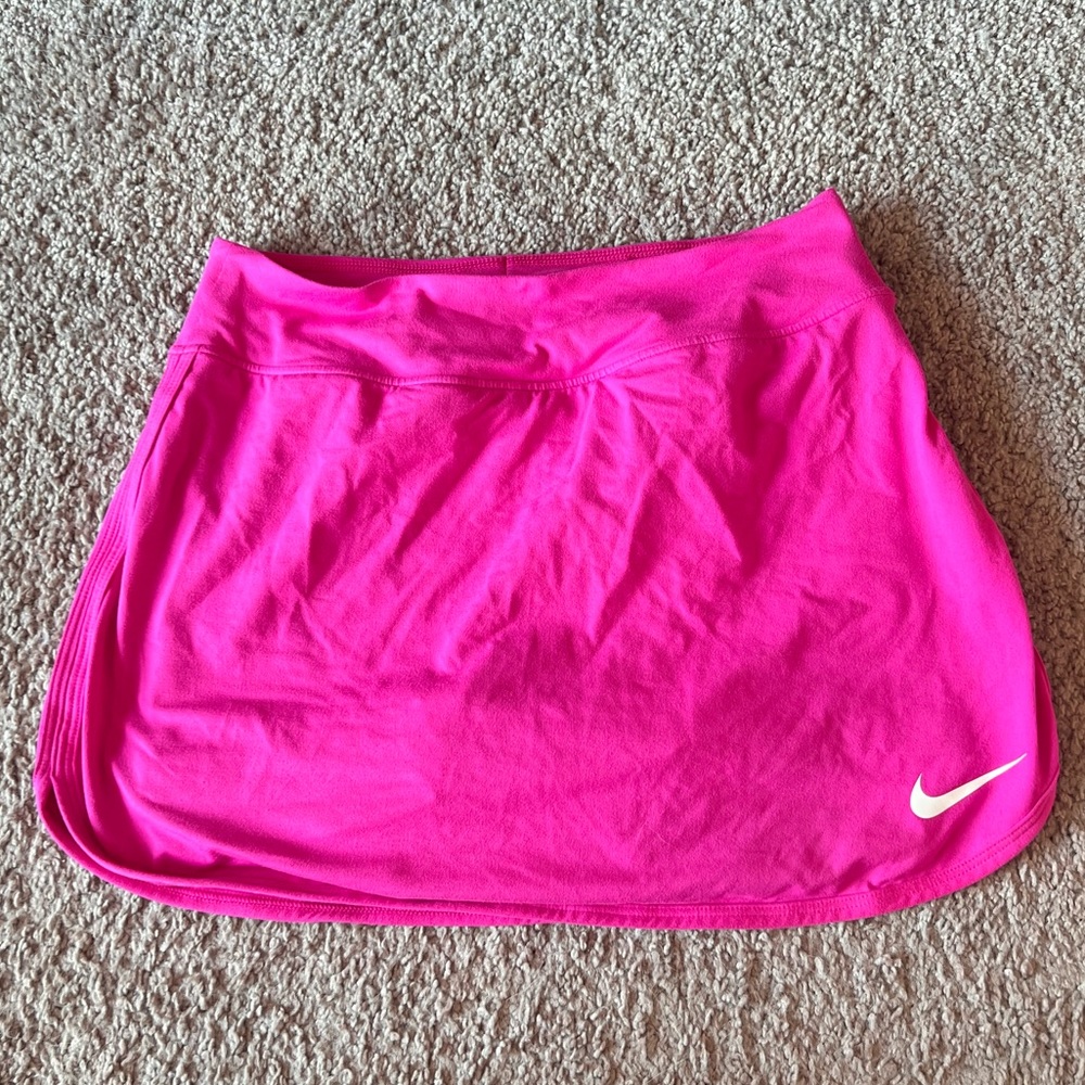 Nike Tennis skirt with shorts underneath. Barely worn. Basically new.
